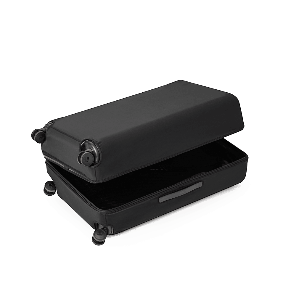 July_Stretch_Luggage_Cover_Checked_Plus_Black_5_dcbf43a386.png