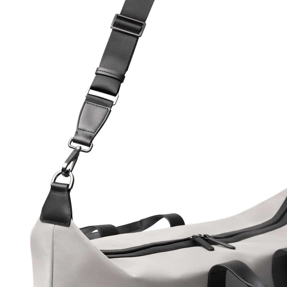 Clip on the adjustable shoulder strap to carry with you wherever you go.